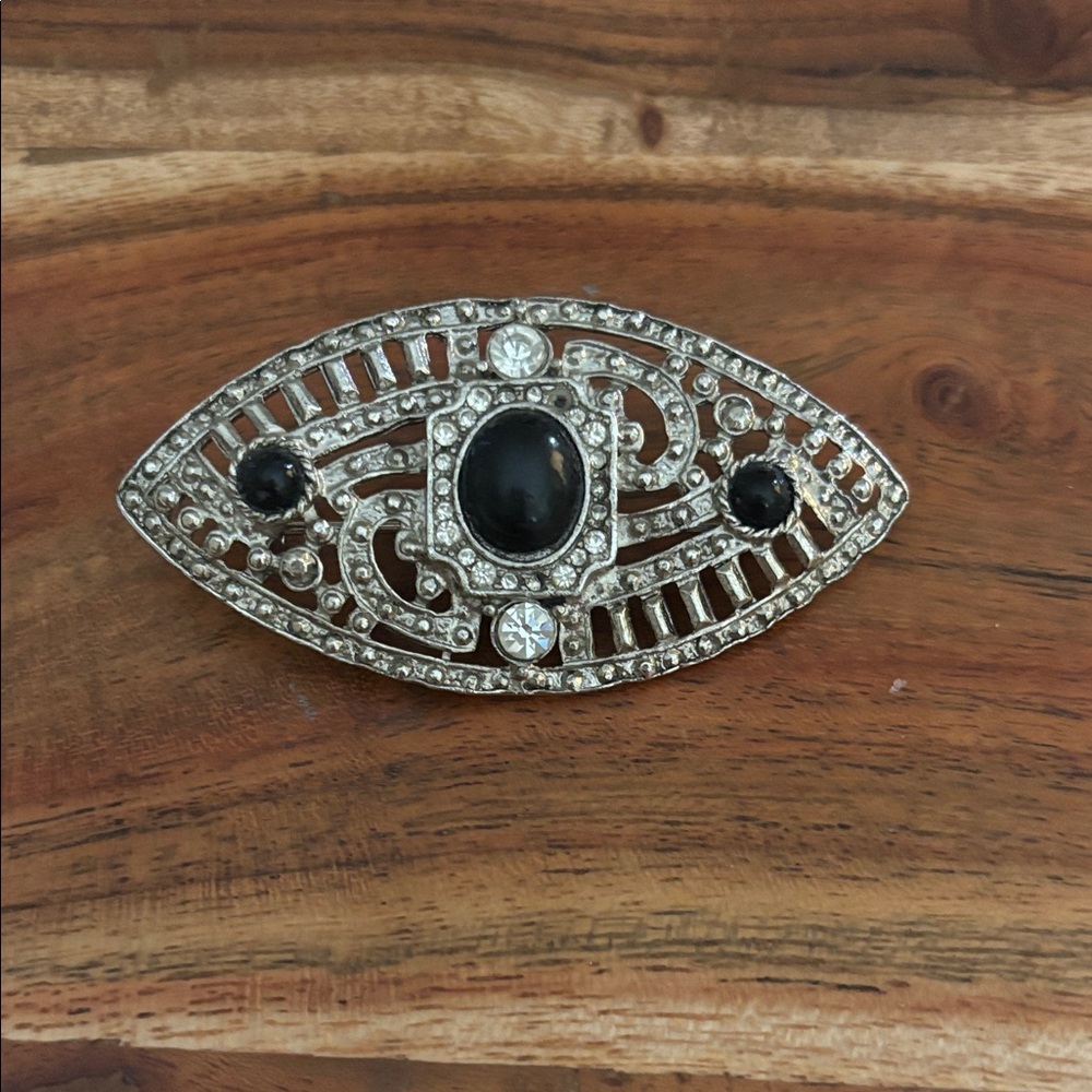 Elegant Silver and Black Brooch
